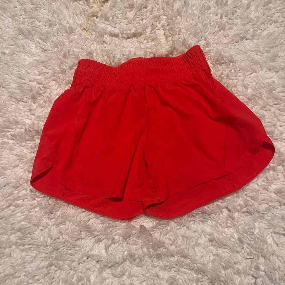 Lululemon running shorts, bright red